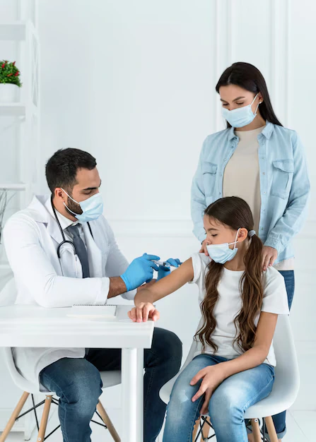 doctor-vaccinating-little-girl-that-s-supported-by-her-mother_23-2148755610